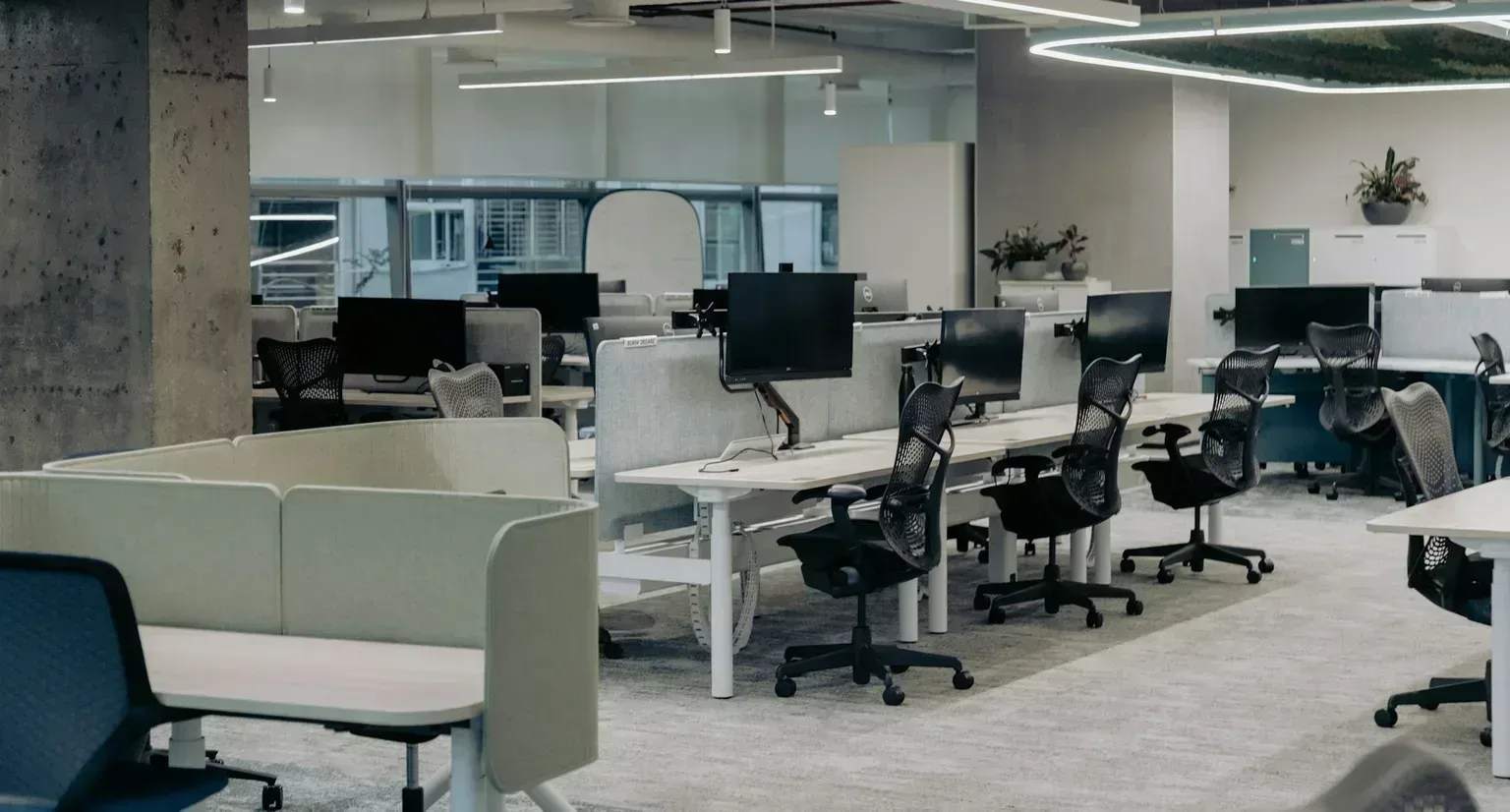 Business professionals using rented IT equipment in a Bangalore office
